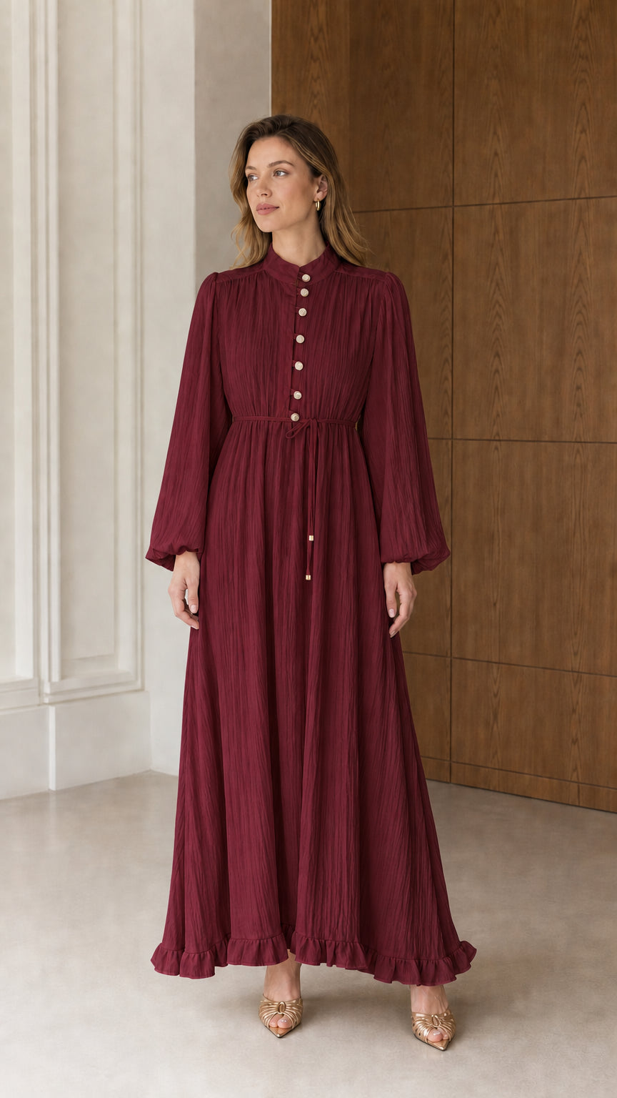 Full front view of the Burgundy wine red long sleeve pleated maxi dress with ruffle hem