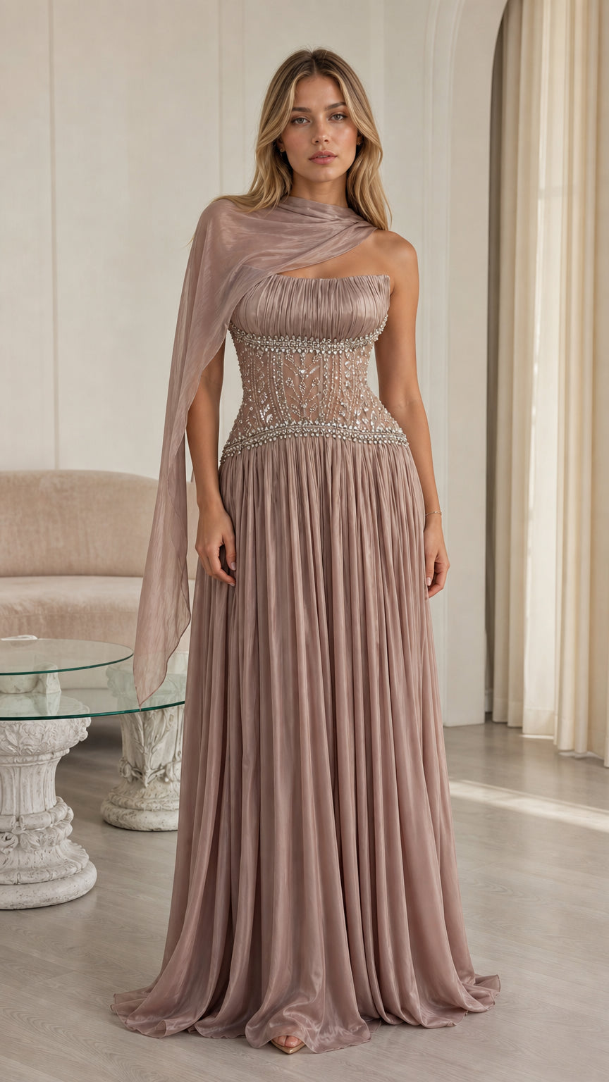 Front view of model wearing dusty mauve pleated chiffon evening gown with beaded corset and neck drape