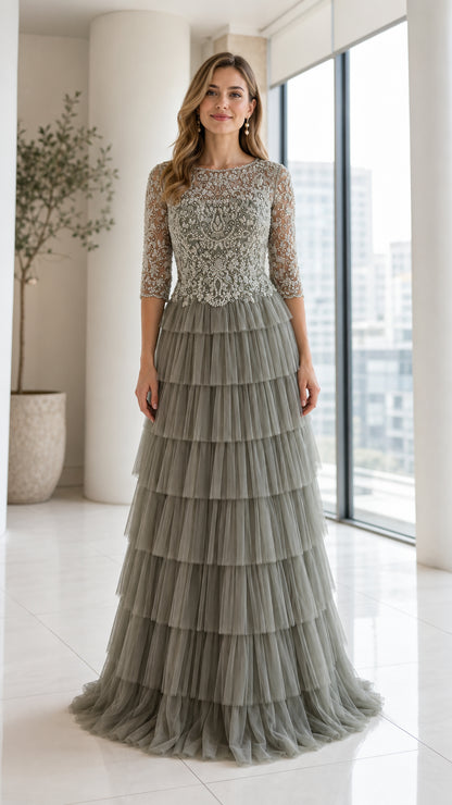 Front view of model wearing Sage Green beaded bodice tiered tulle maxi dress