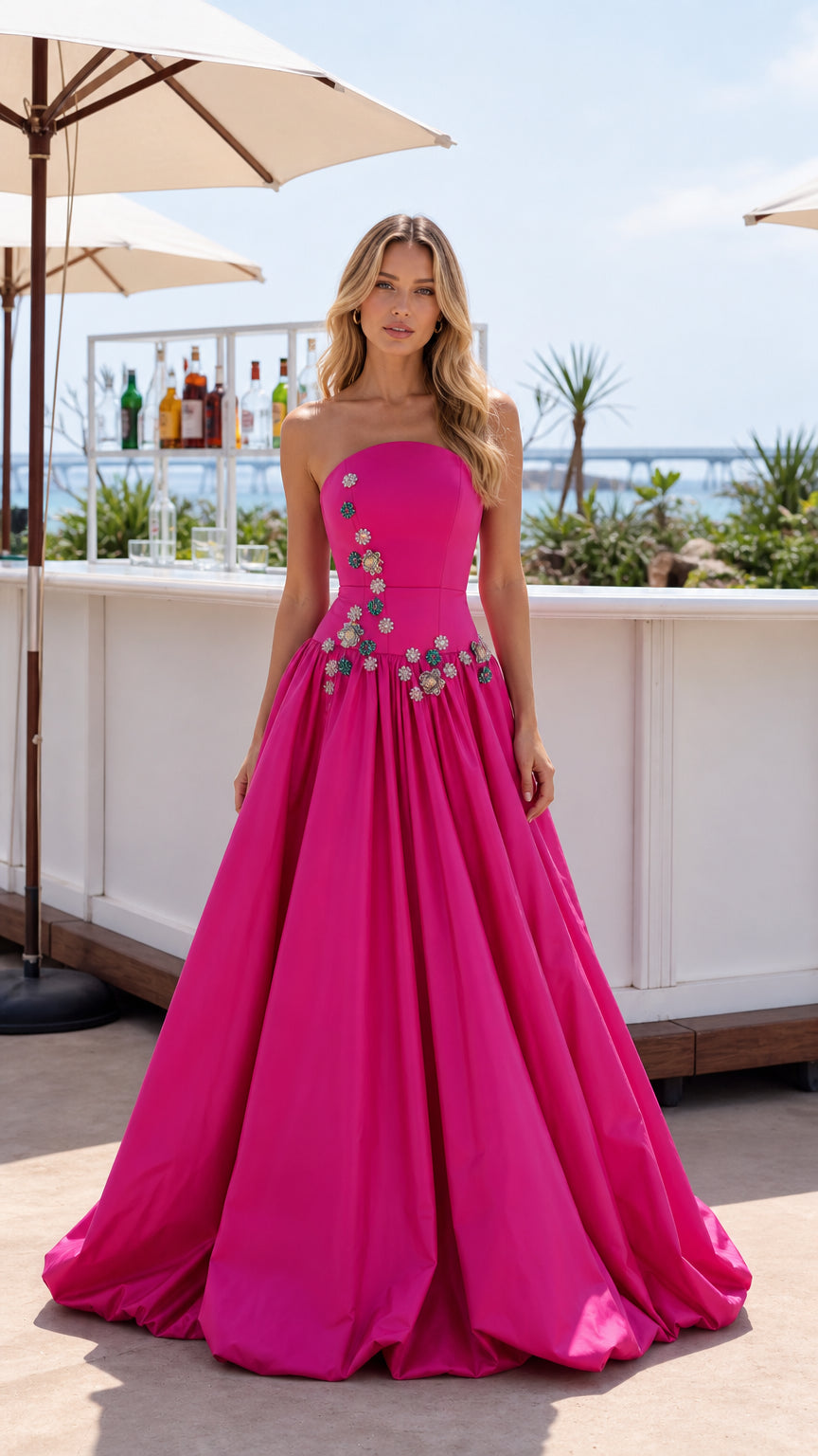 Model wearing Hot Pink strapless crystal embellished evening gown front view