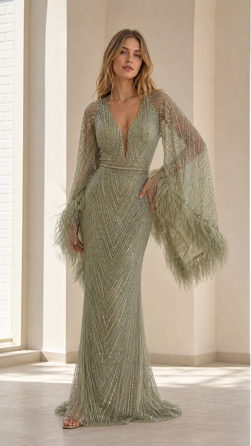 Front view of model wearing sage green sequin maxi evening gown with feather bell sleeves