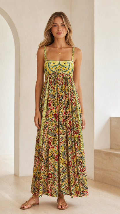 Front view of model wearing yellow boho floral print square neck maxi dress