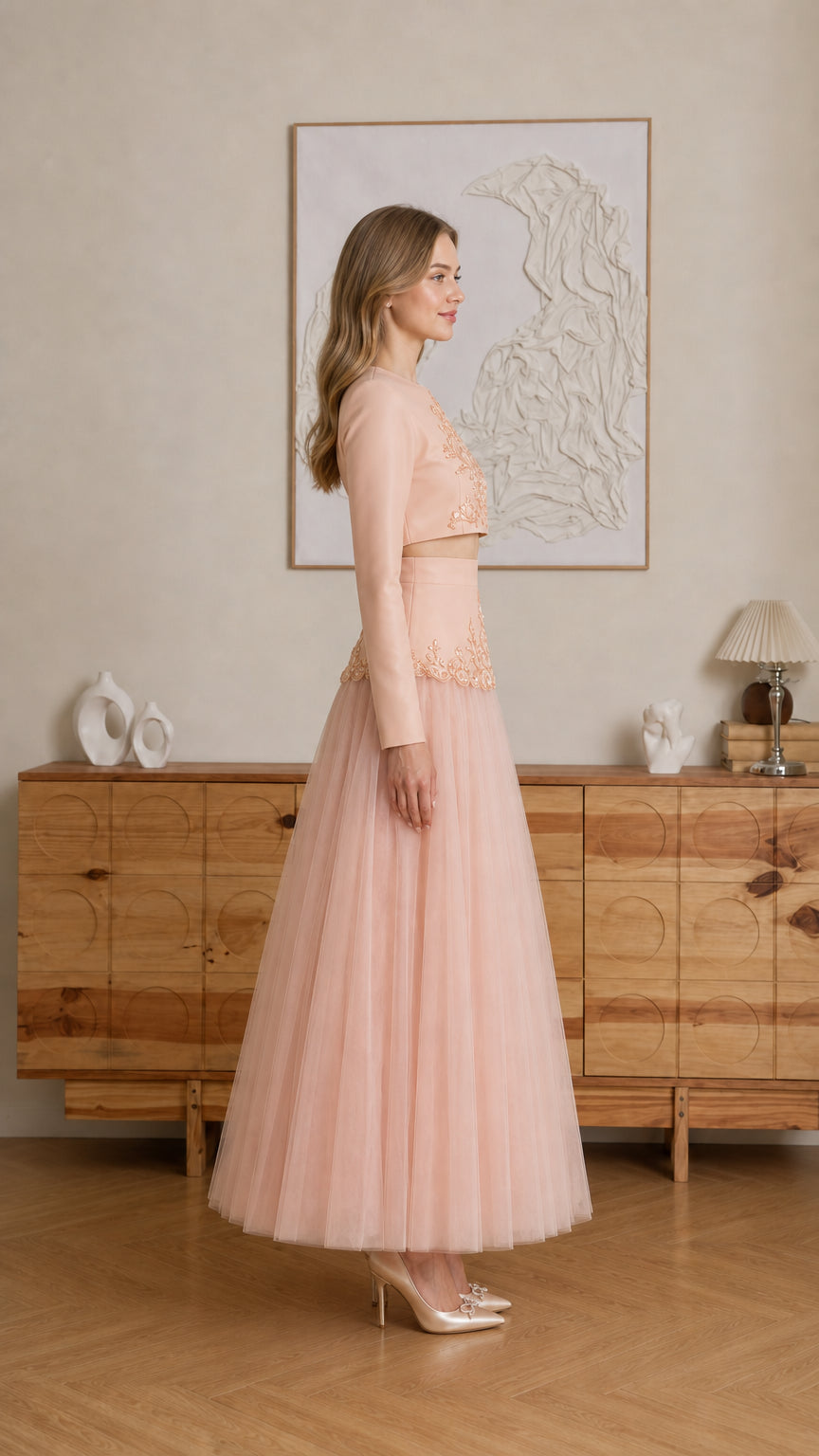 Model wearing Blush Pink two-piece evening set - side profile view