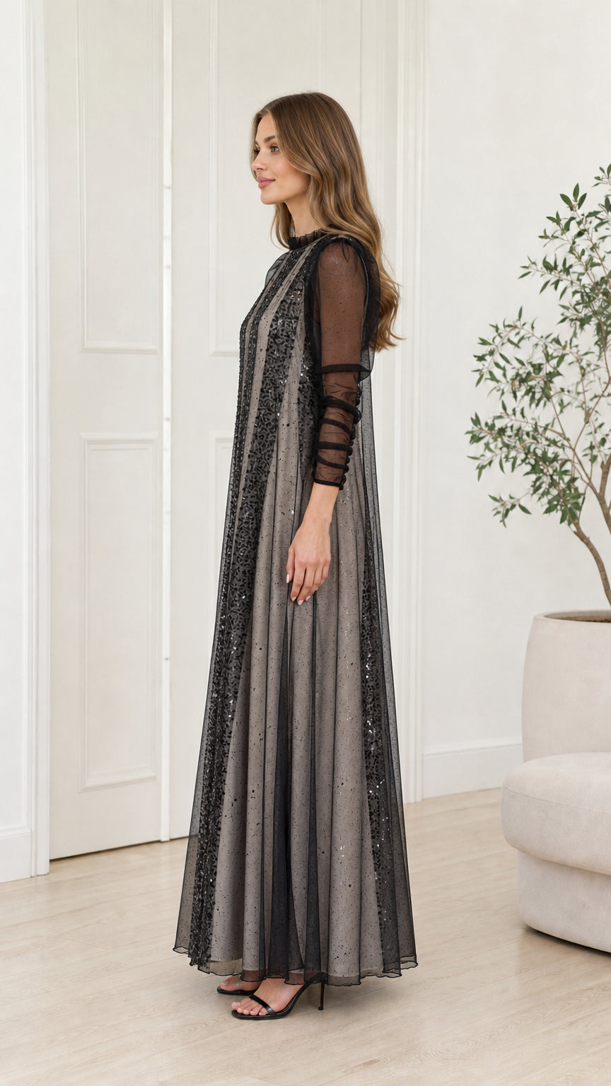 Side profile view of the Silver Gray sequin evening gown showing flowing A-line drape