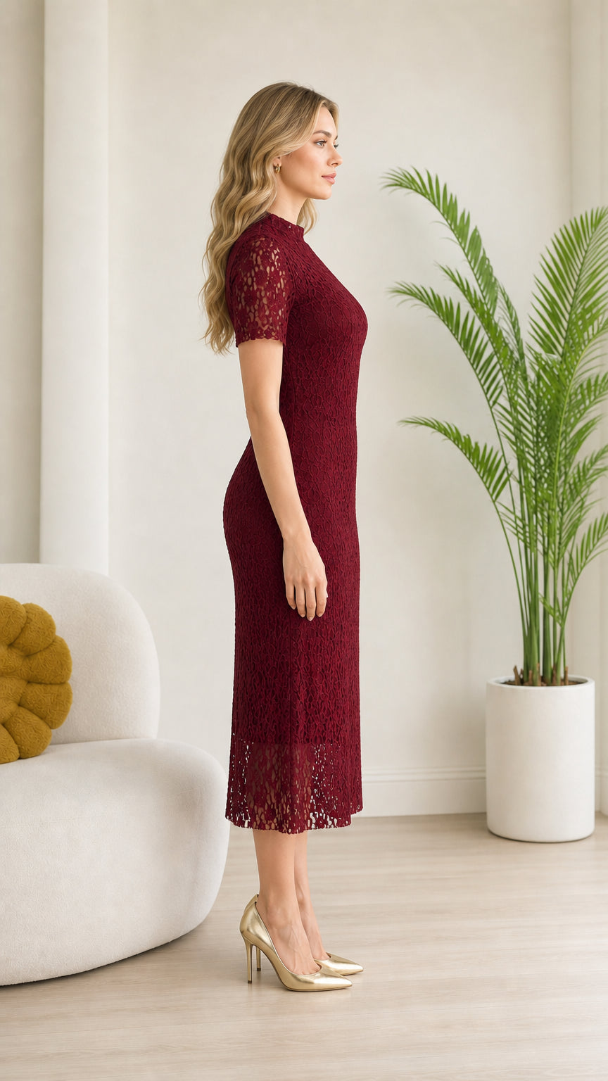 Side profile view of model wearing Burgundy short sleeve lace sheath dress