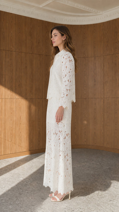 Side profile view of ivory floral lace two-piece trouser set