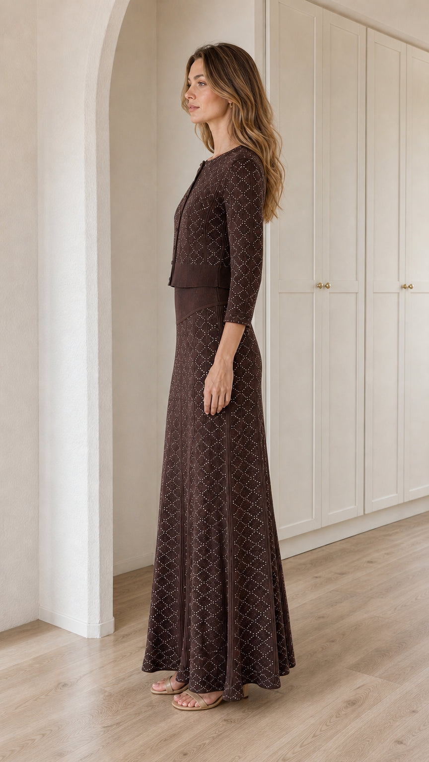 Side profile view of Chocolate Brown two-piece knit cardigan and long skirt set