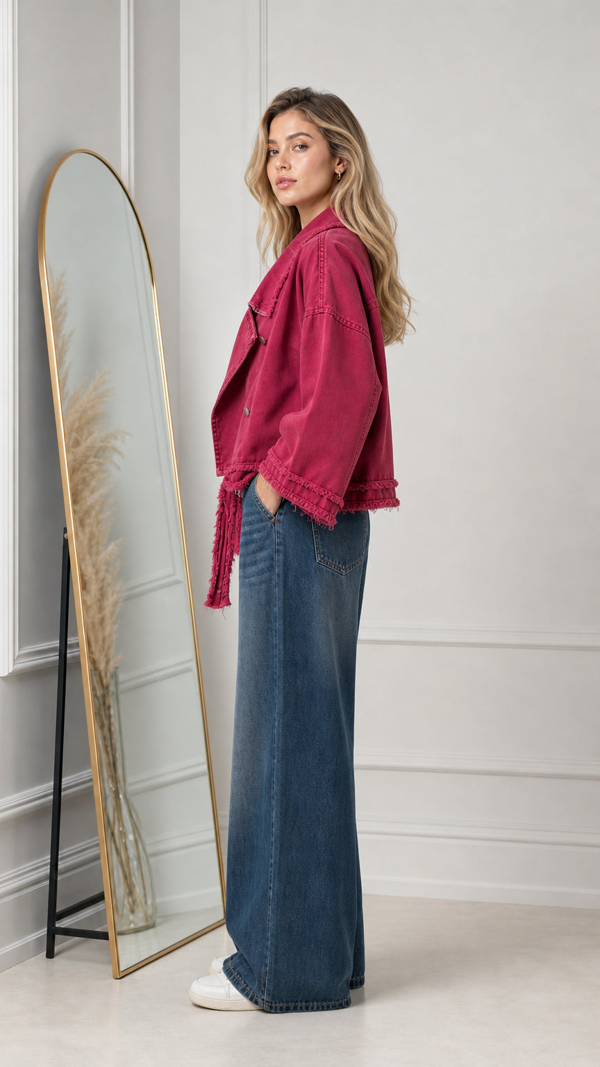 Side view of magenta cropped fringe twill jacket showing boxy relaxed fit