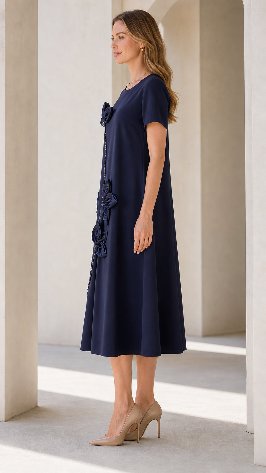 Side profile of Navy Blue floral applique midi dress