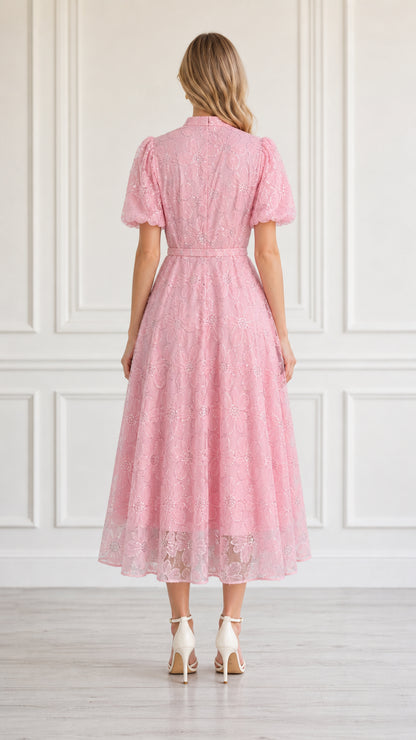 Back view of model in pink midi dress