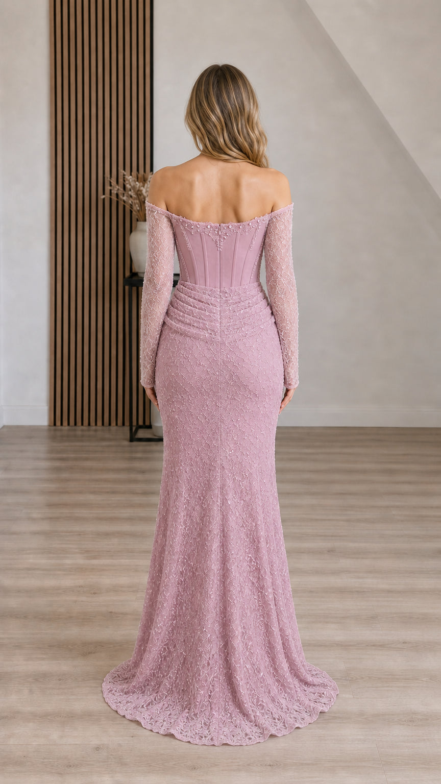 Back view of woman wearing Dusty Mauve off-the-shoulder sequined evening dress showing fitted back silhouette