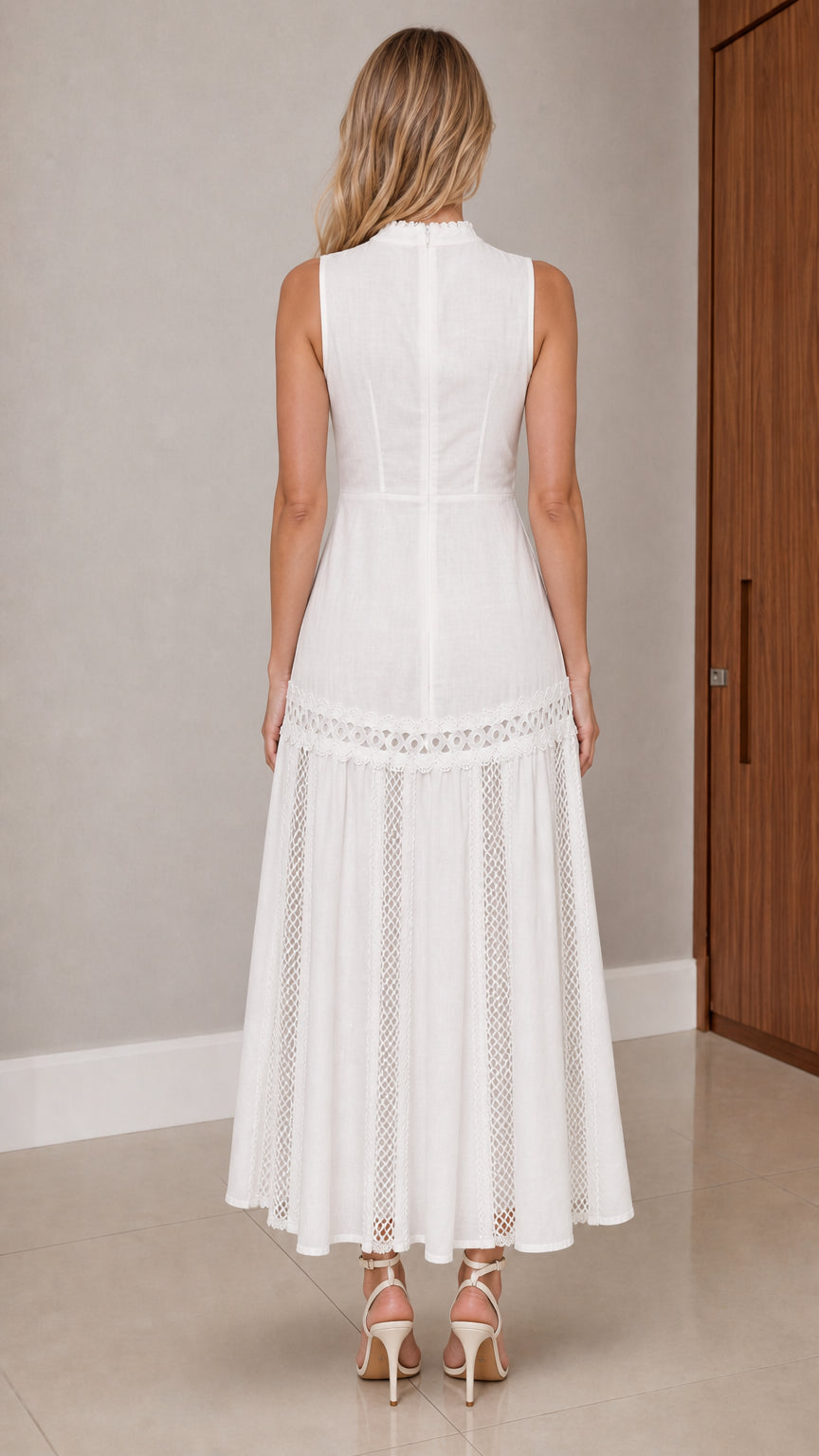 Back view of model wearing white sleeveless A-line lace insert maxi dress