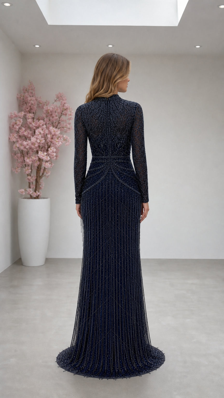 Back view of model in Navy Blue long sleeve embellished maxi dress