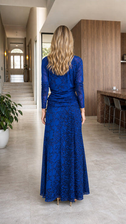 Model wearing royal blue high neck cutout lace maxi dress back view