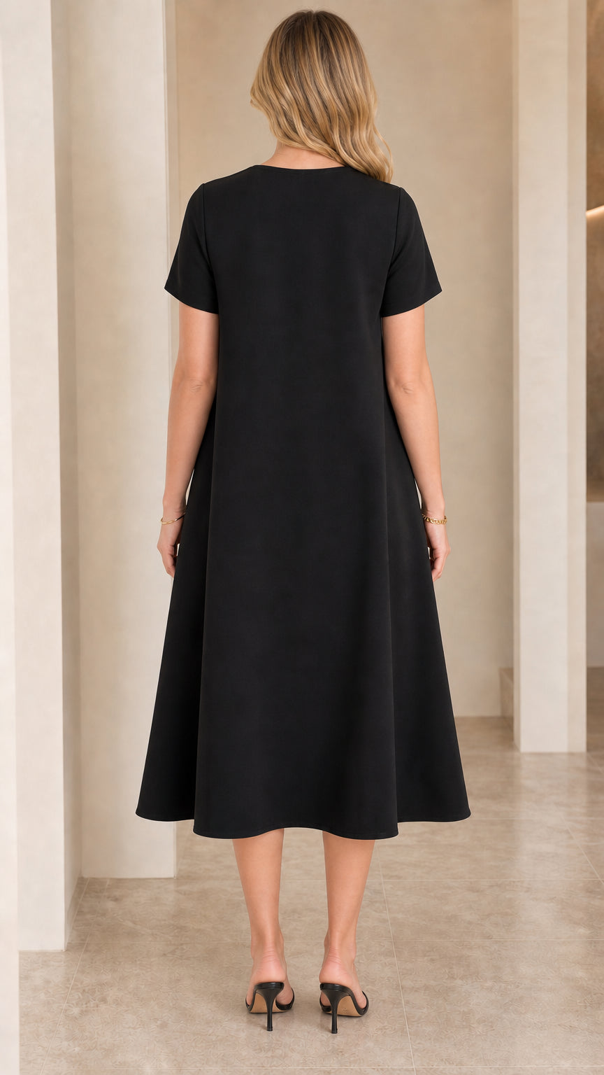 Back view of woman wearing Black short-sleeve crewneck midi dress