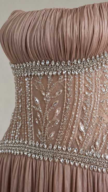 Close-up detail of crystal and rhinestone beading on corset midriff of formal chiffon gown