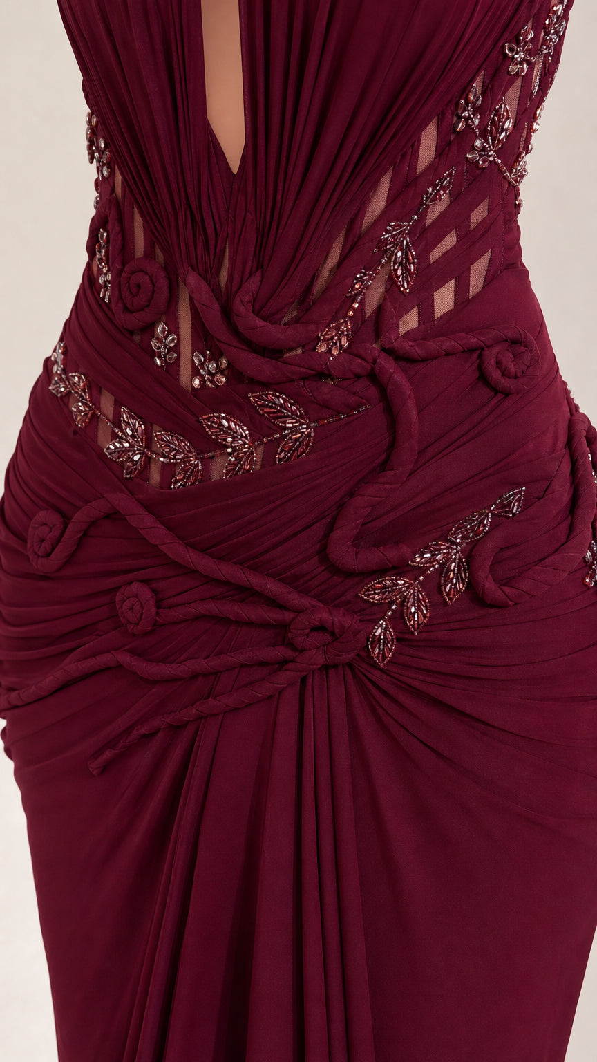Close up of beaded embroidery and ruched detailing on bodice