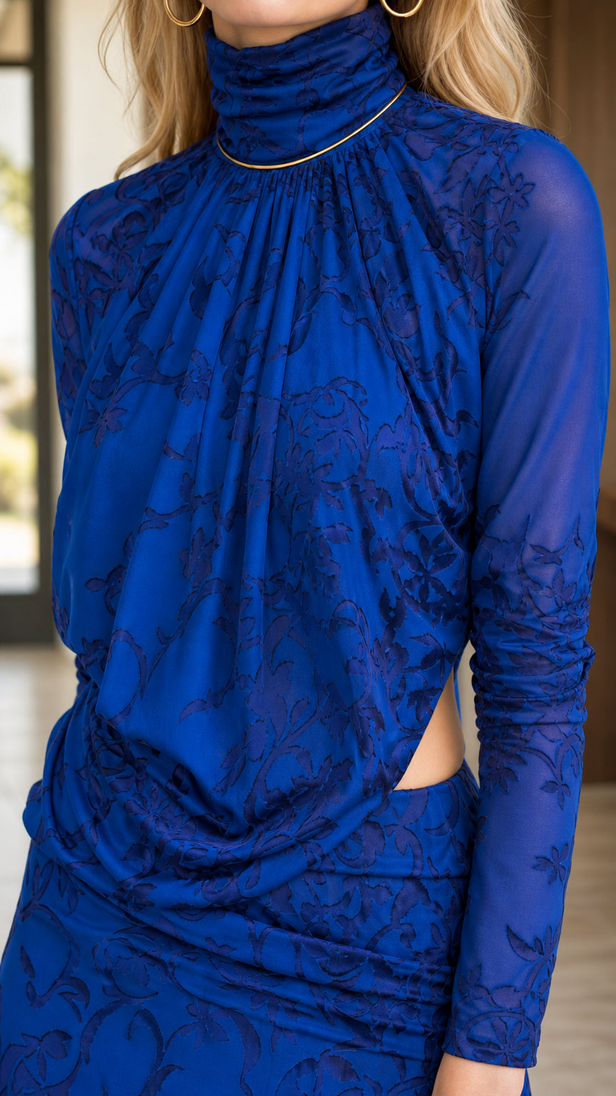 Close up of draped mock neckline and textured lace detail on royal blue maxi dress