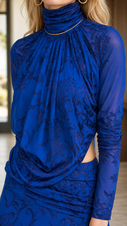 Close up of draped mock neckline and textured lace detail on royal blue maxi dress