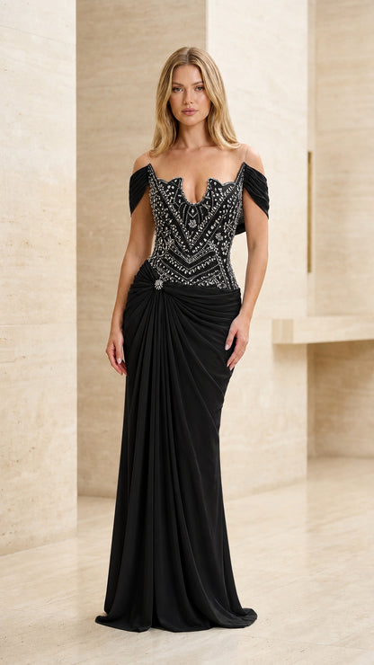 Model wearing black beaded off-the-shoulder formal evening dress