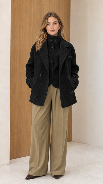 Full front view of women's black double-breasted wool blend peacoat