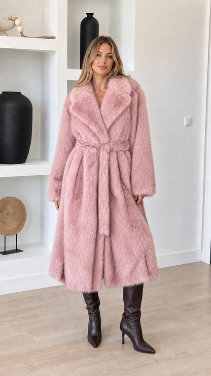 Full-length view of model wearing dusty pink faux fur long wrap coat