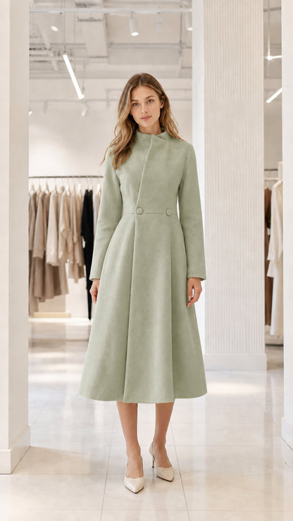 Sage green stand-collar swing midi dress coat front view on model