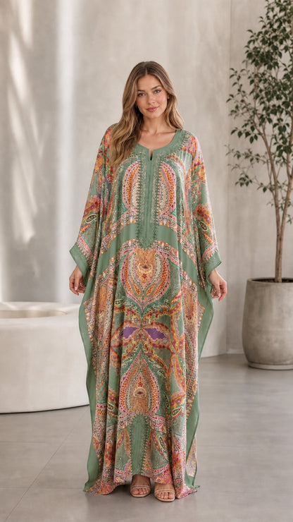 Front view of model wearing Sage Green bohemian print kaftan dress