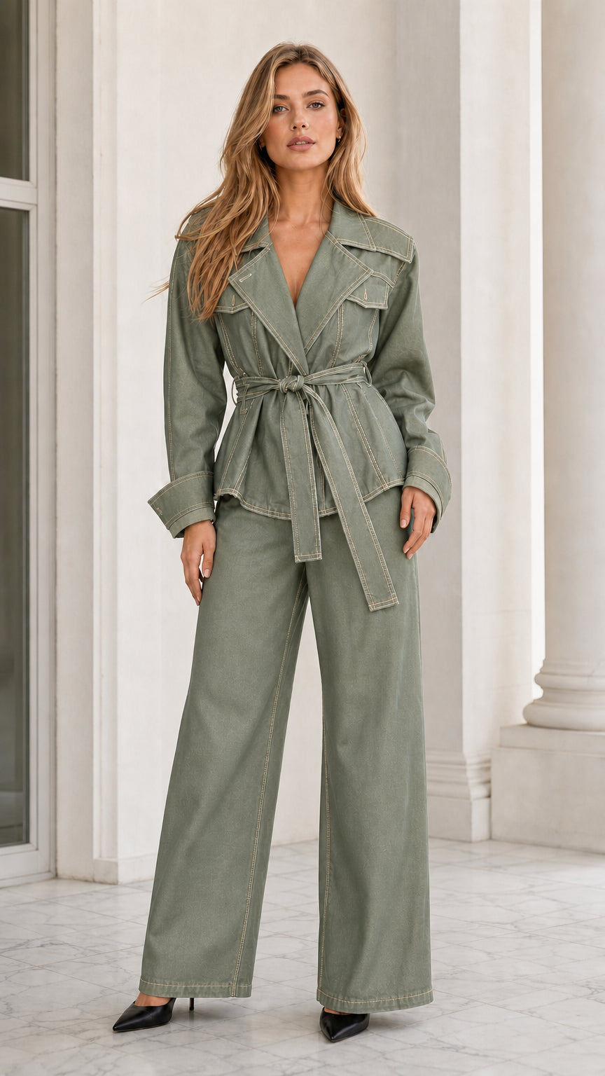 Model wearing sage green contrast stitch belted denim jacket and wide-leg pants set