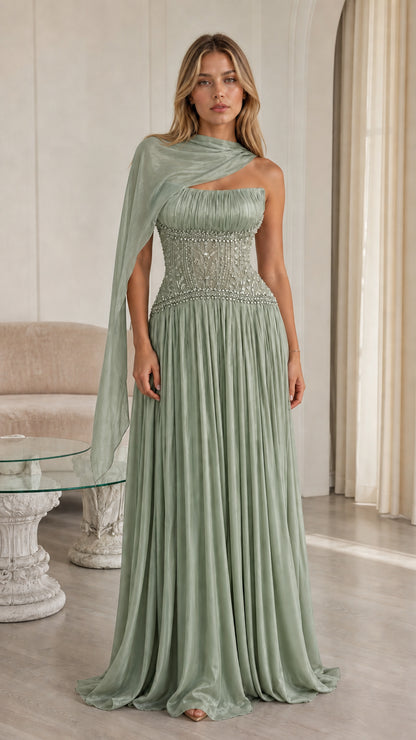 Front view of sage green pleated chiffon formal gown with crystal waist detail
