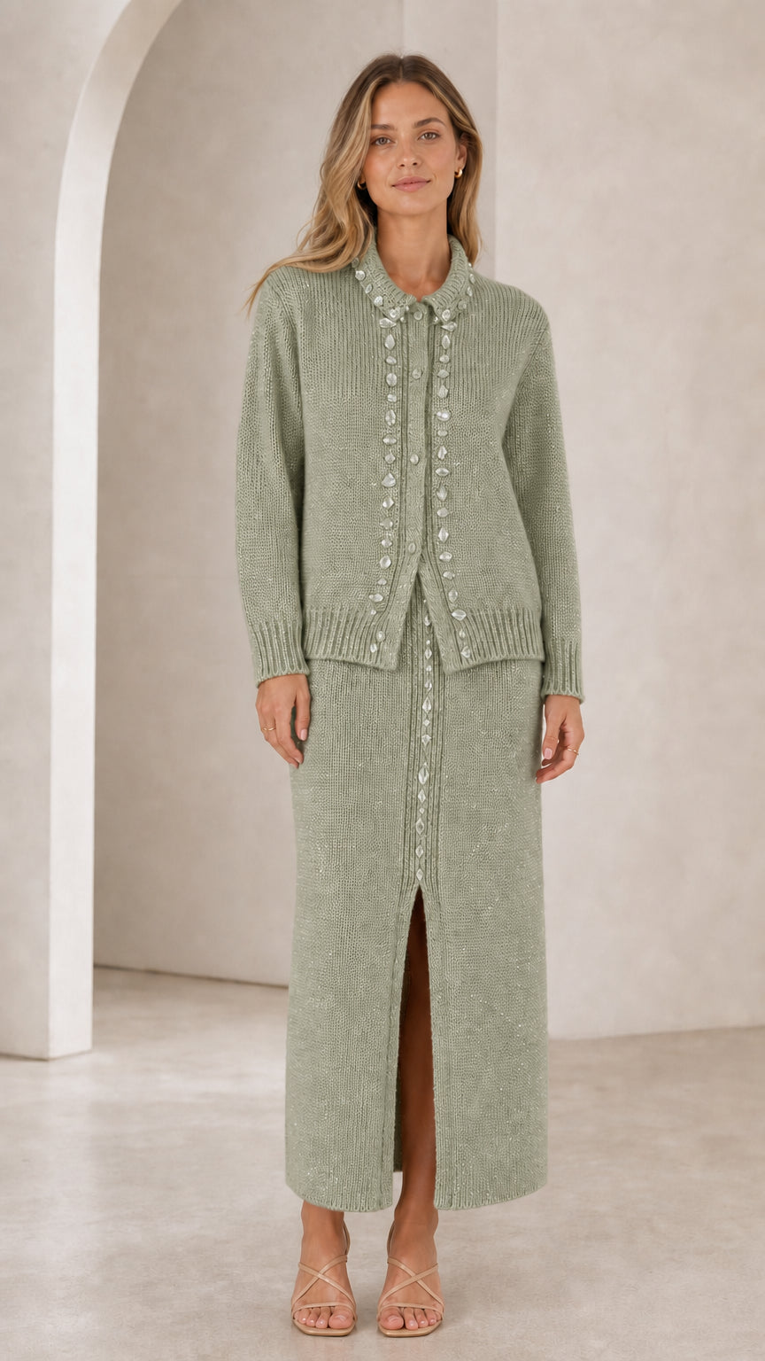 Front view of woman wearing sage green rhinestone-embellished knit cardigan and maxi skirt set