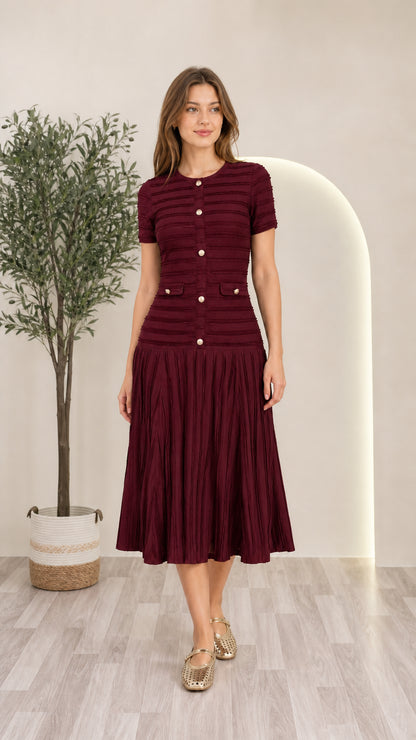 Model wearing burgundy wine red short sleeve pleated knit midi dress