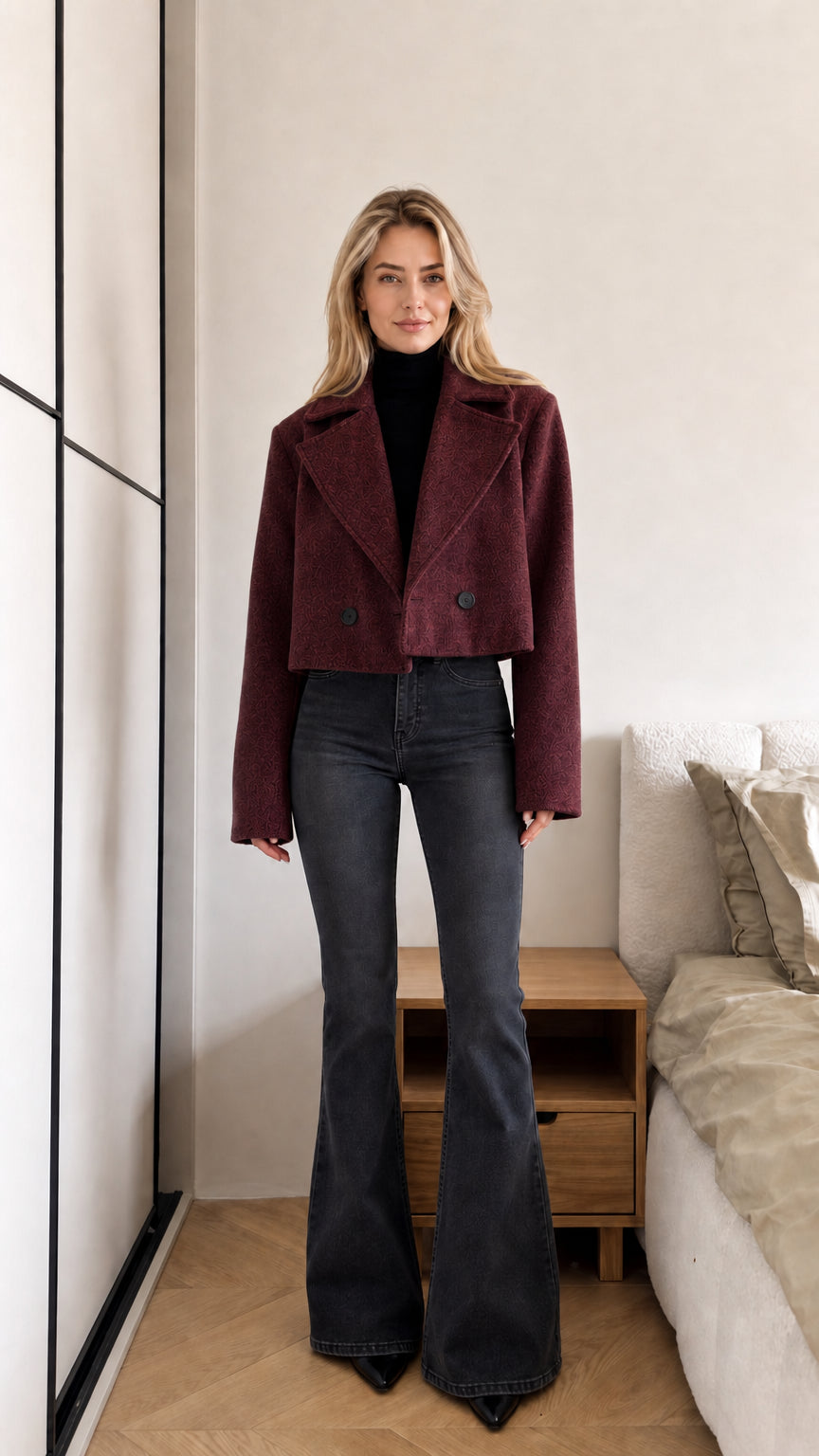 Model wearing rich burgundy cropped pea coat jacket with black flare pants