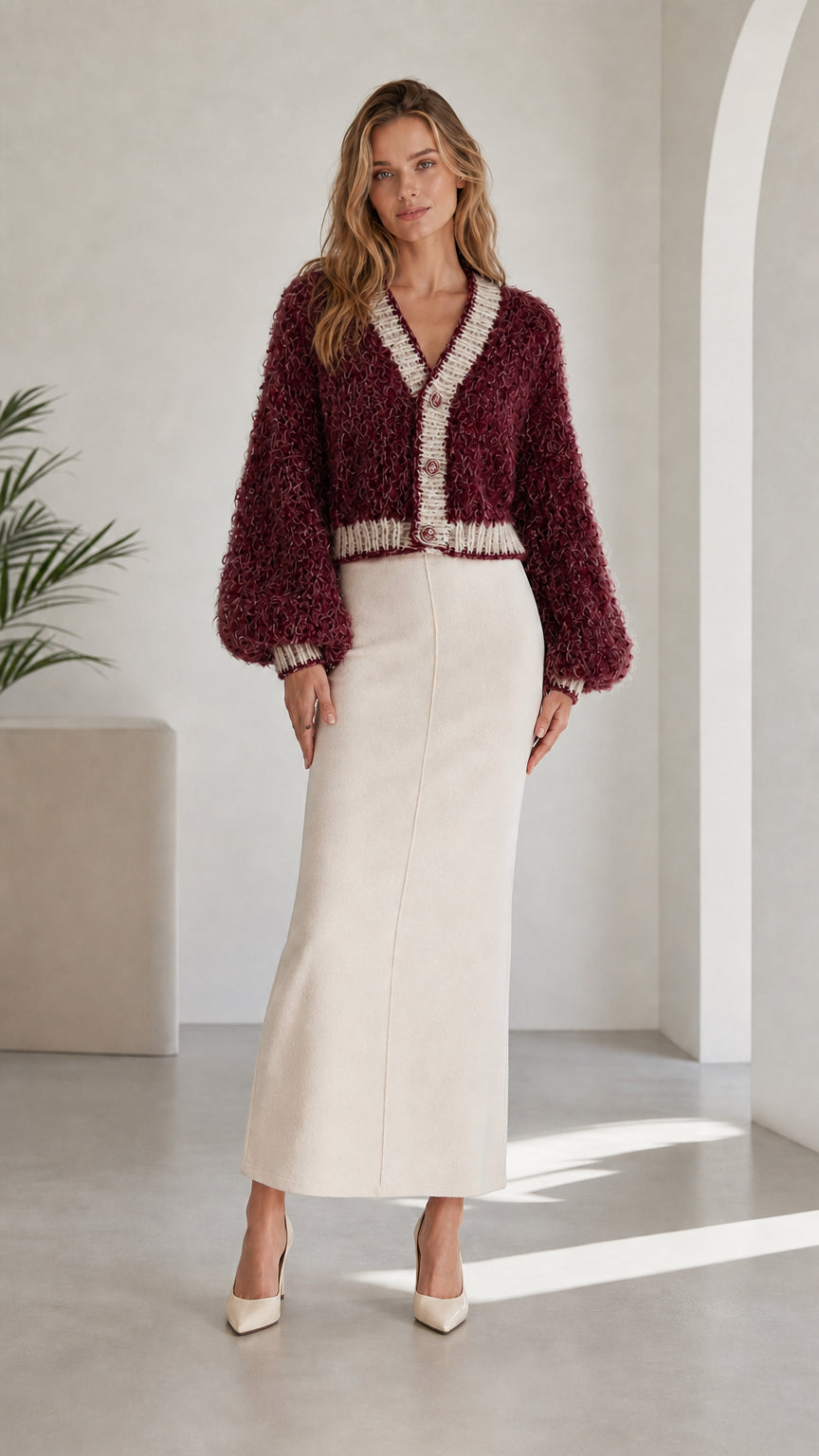 Model wearing burgundy red fluffy knit cropped cardigan with contrast trim