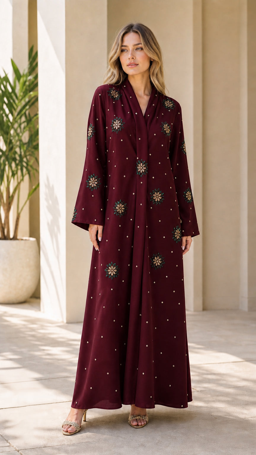 Front view of burgundy red crystal embellished formal maxi dress