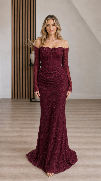Front view of woman wearing Burgundy wine off-the-shoulder corset long sleeve evening dress