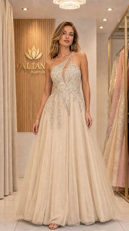 Front view of woman wearing champagne one-shoulder beaded tulle evening gown