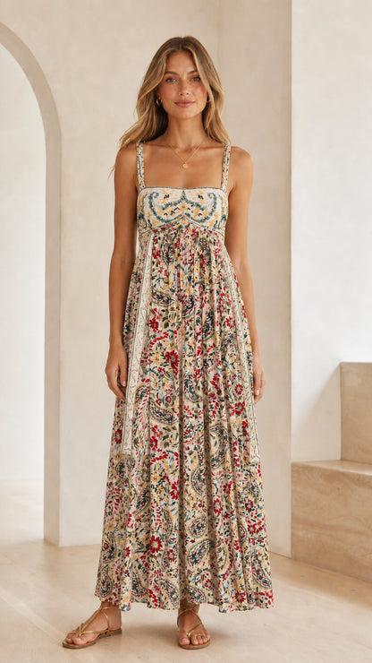 Front view of model wearing cream floral print square neck maxi dress