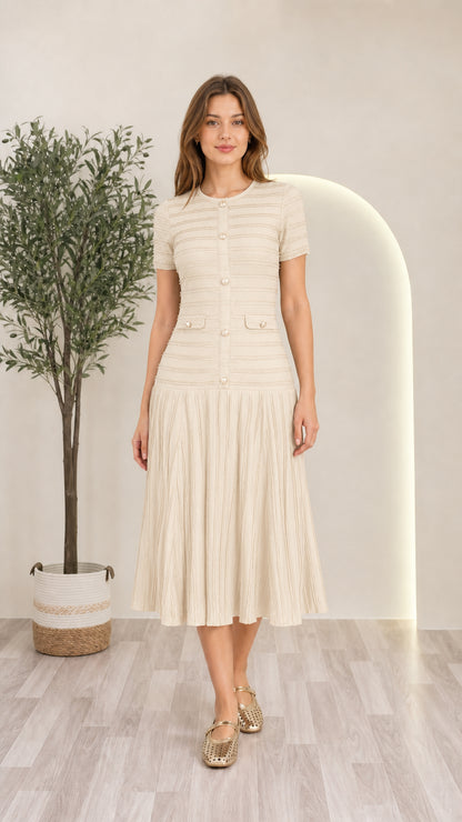 Model wearing cream off-white short sleeve pleated knit midi dress