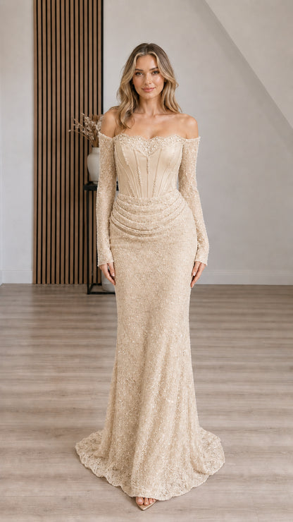 Front view of woman wearing Champagne gold off-the-shoulder long sleeve sequin evening gown
